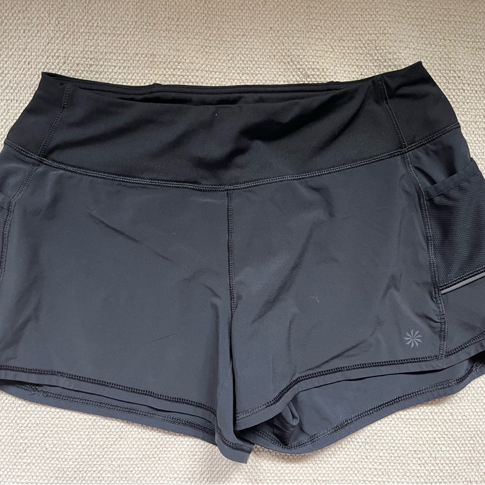 Athleta running shorts black pockets